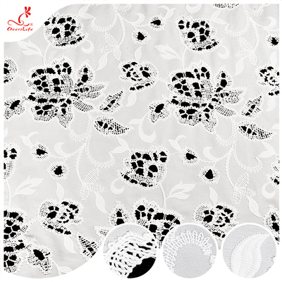 Venta caliente Tejido bordado blanco floral suave hueco del ojo poliéster bordado